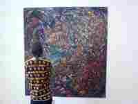 Lukáš Hladík před obrazem Otto Plachta